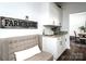 Cozy dining area with built-in cabinets, a comfortable bench, and natural light at 1575 Lewis Farm Rd, Kings Mountain, NC 28086