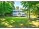 Traditional two-story home with a large front yard and mature trees at 1575 Lewis Farm Rd, Kings Mountain, NC 28086