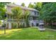 Exterior view of home with a screened-in porch and large backyard at 1575 Lewis Farm Rd, Kings Mountain, NC 28086