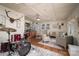 Cozy living room featuring hardwood floors, comfortable seating, and rustic decor at 1575 Lewis Farm Rd, Kings Mountain, NC 28086