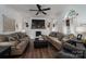 Comfortable living room with neutral tones, fireplace, and abundant natural light at 1575 Lewis Farm Rd, Kings Mountain, NC 28086