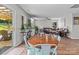 Inviting dining area features wood floors, a round table, and a view of the outdoor space at 176 Pleasant Grove Ln, Mooresville, NC 28115