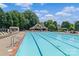 A beautiful community swimming pool with a covered picnic area and plenty of space to relax at 176 Pleasant Grove Ln, Mooresville, NC 28115