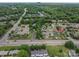 Aerial view of a neighborhood featuring tree-lined streets and well-maintained homes at 1909 Wexford Ct, Gastonia, NC 28054