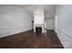 Spacious living area features high ceilings, fireplace, and dark floors at 1909 Wexford Ct, Gastonia, NC 28054