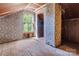 Attic room with patterned walls, hardwood floors and a window with natural light at 204 Blanche Ave, Belmont, NC 28012