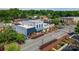 Aerial view of a charming downtown street with brick sidewalks and quaint storefronts in a vibrant setting at 204 Blanche Ave, Belmont, NC 28012