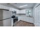 Updated kitchen featuring stainless steel appliances and granite countertops at 2214 Grimes St, Charlotte, NC 28206