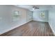 Spacious living room with hardwood floors and natural light from multiple windows at 2214 Grimes St, Charlotte, NC 28206
