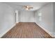 Spacious living room with hardwood floors and a ceiling fan at 2214 Grimes St, Charlotte, NC 28206