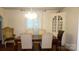 Dining room featuring a wooden table with chairs and a decorative cabinet at 229 W Park Ave, Mooresville, NC 28115