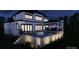 Night view of backyard featuring a lighted pool, hot tub and outdoor living space at 268 Hermance Ln, Mooresville, NC 28117