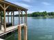 Private covered boat dock on a tranquil lake setting at 268 Hermance Ln, Mooresville, NC 28117