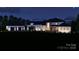 Stunning two-story home featuring a modern design and an attached three-car garage at 268 Hermance Ln, Mooresville, NC 28117