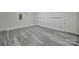 Finished basement with grey floors and trim at 2706 Stagbuck Dr, Gastonia, NC 28052
