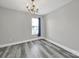 Bedroom featuring gray walls and flooring with a single window at 2706 Stagbuck Dr, Gastonia, NC 28052