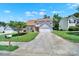 Charming two-story home features a well-manicured lawn, a long driveway, and a front-facing two-car garage at 2706 Stagbuck Dr, Gastonia, NC 28052