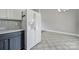 The kitchen is adjacent to an eating area and includes a white refrigerator, two-tone cabinets, and tiled backsplash at 2706 Stagbuck Dr, Gastonia, NC 28052