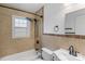 Well-lit bathroom with shower-tub combo, and single sink at 2953 Enfield Rd, Charlotte, NC 28205