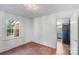Bright dining area with wood-look flooring, beadboard walls, and natural light at 2953 Enfield Rd, Charlotte, NC 28205