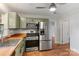 Updated kitchen featuring stainless steel appliances and wood countertops at 2953 Enfield Rd, Charlotte, NC 28205