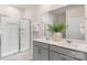 Modern bathroom featuring a double vanity, quartz countertop, and glass-enclosed shower at 3019 Sassafrass Trl, Gastonia, NC 28056