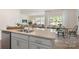 Open kitchen and dining area featuring granite counters, stainless steel appliances, and plenty of natural light at 3019 Sassafrass Trl, Gastonia, NC 28056