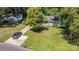 Aerial shot of a charming home showcasing its well-maintained lawn and driveway at 3331 Eastwood Dr, Charlotte, NC 28205