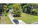 Overhead shot showing a nice home with a long driveway and lawn at 3331 Eastwood Dr, Charlotte, NC 28205