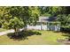 Charming home featuring a lush front lawn and well-manicured landscaping at 3331 Eastwood Dr, Charlotte, NC 28205