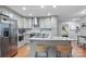Bright kitchen with stainless steel appliances, granite counters, and center island at 3809 Topsfield Rd, Charlotte, NC 28211