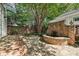 Stone patio with a brick fountain and stone pathway at 402 W 8Th St, Charlotte, NC 28202