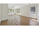Expansive bedroom boasts beautiful hardwood floors and bright, large windows, offering abundant natural light at 402 W 8Th St, Charlotte, NC 28202