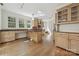 Bright kitchen with wood cabinets, stainless steel appliances, hardwood floors, and lots of natural light at 402 W 8Th St, Charlotte, NC 28202