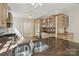 Well-equipped kitchen with stainless steel appliances, wood cabinets, an island, and a built-in sink at 402 W 8Th St, Charlotte, NC 28202