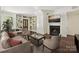 Cozy living room with built-in bookshelves, fireplace, and ample seating at 402 W 8Th St, Charlotte, NC 28202