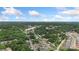 An aerial view showcases lush greenery, interspersed with homes and local businesses at 418 Link St, Fort Mill, SC 29715