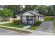 Charming bungalow with black and white trim, inviting porch, and manicured landscaping at 418 Link St, Fort Mill, SC 29715