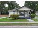Charming bungalow with black and white trim, inviting porch, and manicured landscaping at 418 Link St, Fort Mill, SC 29715