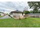 Cozy home with a new deck, well-manicured lawn, and covered parking area at 418 Link St, Fort Mill, SC 29715
