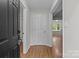 Inviting entryway with neutral walls, hardwood floors, and clear sightlines to adjoining rooms at 4232 Saint Audrey Pl, Charlotte, NC 28269