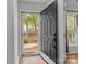 Inviting entryway with neutral walls, hardwood floors, and clear sightlines to the front yard at 4232 Saint Audrey Pl, Charlotte, NC 28269