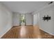 Bright living room with hardwood floors and neutral walls at 4232 Saint Audrey Pl, Charlotte, NC 28269