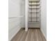 Well-organized closet with wood floors and shelving at 430 Queens Rd # 332, Charlotte, NC 28207