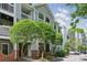 Charming condo building with manicured trees and landscaping at 430 Queens Rd # 332, Charlotte, NC 28207