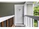 A level entry front door with overhead protection from the elements at 430 Queens Rd # 332, Charlotte, NC 28207