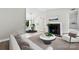 Living room with bright walls and modern fireplace at 430 Queens Rd # 332, Charlotte, NC 28207