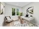 Bright home office featuring a stylish desk, comfortable chair, and lots of natural light at 430 Queens Rd # 332, Charlotte, NC 28207
