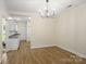 Dining space with stainless appliances, adjacent to kitchen and a view of a brightly-lit room at 608 Camrose Ne Cir, Concord, NC 28025