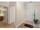 Bright foyer features hardwood flooring, neutral walls, and access to other rooms in the home at 608 Camrose Ne Cir, Concord, NC 28025